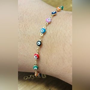Eye charm bracelet gold filled tone